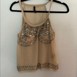 Sequins and beaded top.